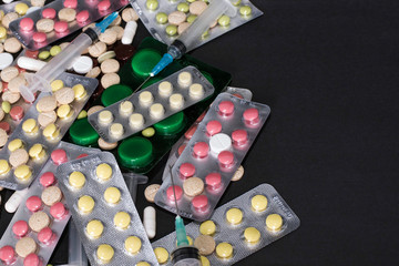 pharmaceuticals antibiotics pills medicine /colorful antibacterials pills on white background /capsule pill medicine. Creative idea. Drugs. Sad. Die. Illness