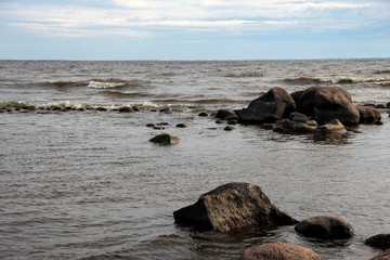 Large waves of sea and stones beach