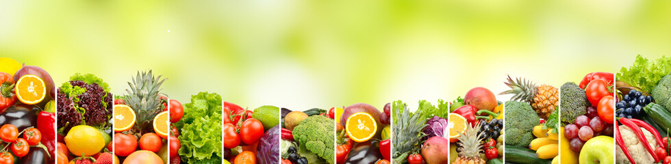 Panorama fruits and vegetables on blurred green background