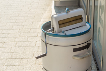 Old retro washing machine called Frania with a laundry wringer