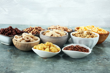 Cereal. Bowls of various cereals for breakfast. Muesli with kids cereals.