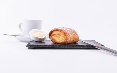 Butter, coffee and a puff pastry for breakfast