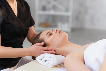 Obraz na płótnie Canvas Handsome caucasian woman during spa treatment in the spa salon.