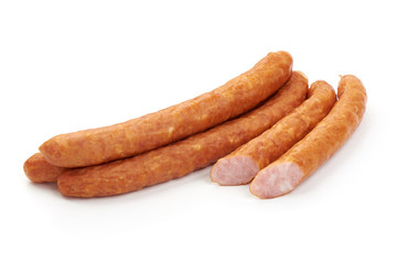 Smoked pork sausages, close-up, isolated on white background