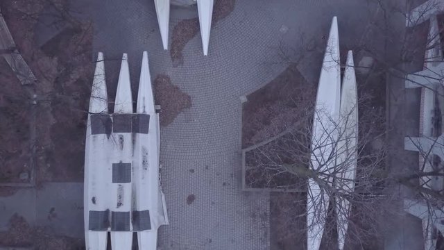 Pan top down reveal shot of boats stowed away
