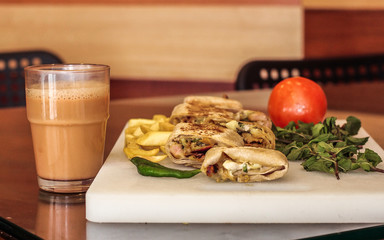 shawarma with tomato sauce and parmesan
