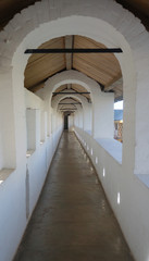 Long white corridor of ancient building