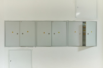 Electrical panel doors on the room wall