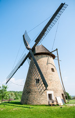 Fototapeta na wymiar View on a traditional windmill in Szentedre