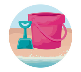 shovel and bucket toy in beach