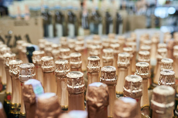 Sealed champagne bottles, background texture - Powered by Adobe