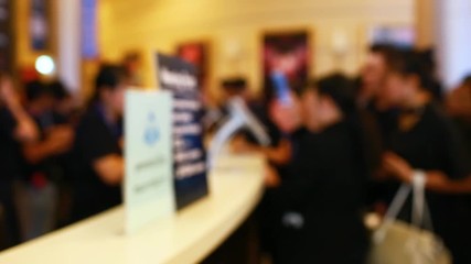 Many business people attending the seminar are scanning QR Code  for registration with smart phone and tablet.
