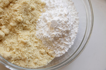 Dry Ingredients for Macarons. Almond flour and confectionery sugar create a nice texture. Baking background.