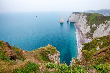 Fototapeta na wymiar Colorful cliffs in Etretat, Atlantic coast of France