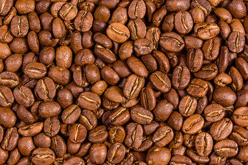 Background of many roasted coffee beans
