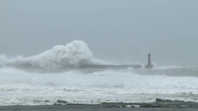 Large Waves Swamp The Entrance To A Port As A Major Hurricane Hits - Megi