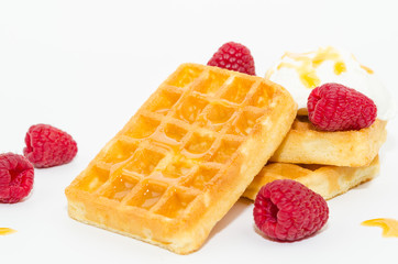 Belgium waffles. Waffle breakfast with yogurt, raspberry and caramel sauce