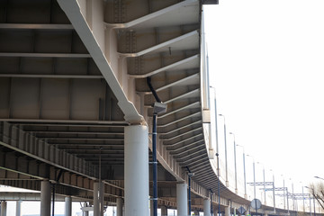 Fototapeta premium architecture of a modern automobile bridge, geometry of lines
