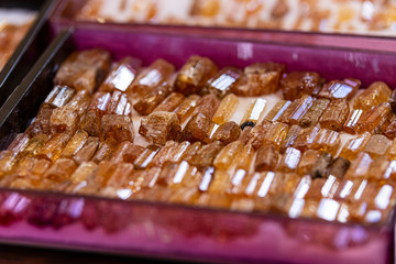 close up on imperial topaz, raw mineral