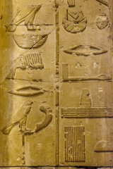 Egyptian ancient hieroglyphs on the stone wall