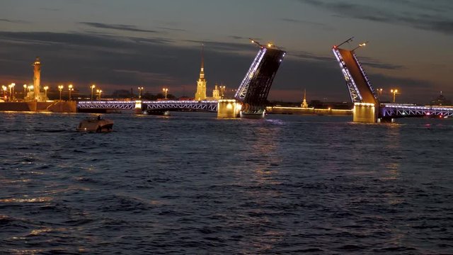 Amazing view of divorce Palace Bridge (Dvortsovy) over Neva River at Saint Petersburg, Russia. White nights in St. Petersburg.