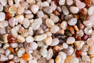 texture of colored polished stones, background
