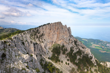 Fototapeta na wymiar View from the top of Ai-Petri mountain at the seaside of Black Sea, Crimea