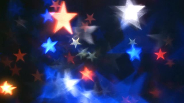 Americana Star Flow Two 4K Loop features red, white, and blue stars of various sizes floating across screen in an abstract composite loop