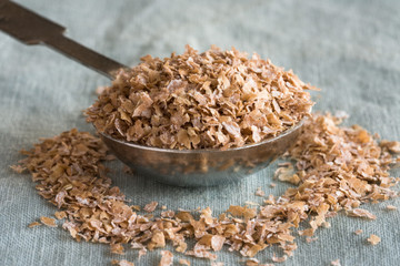 Wheat Bran Spilled from a Tablespoon
