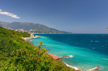 Bright beautiful blue azure seaside with corals sand and stones near Yalta, Crimea like maldives