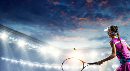 Young woman playing tennis in action. Mixed media