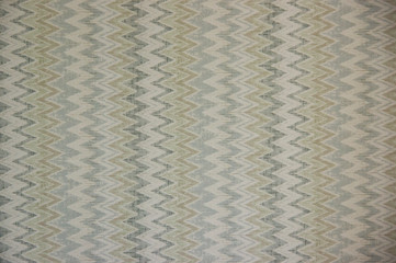 background of fabric with a pattern of winding lines