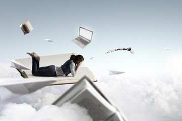 Little woman with large book concept