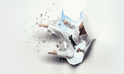 Effect of torn paper with karate beat © Sergey Nivens