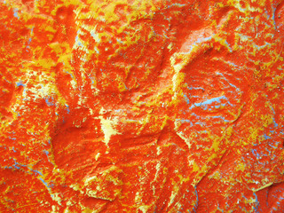 Stone tiles covered with colorful paints. Background. Texture.