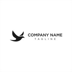 flying dove silhouette logo