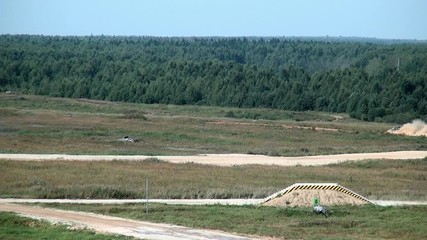 Military tracked tank war machine at exercises. Concept technology and power in military industry. Forum army 2017 Polygon Alabino.