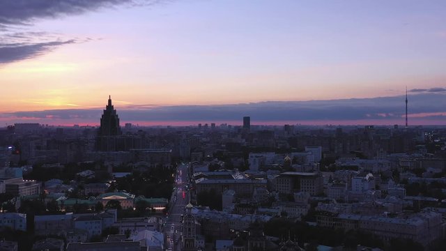 Aerial photography in the center of Moscow at sunset. The drone is flying in the direction of Karetny Ryad Street and Petrovka. On the right is the Ostankino Tower, 540 meters high.