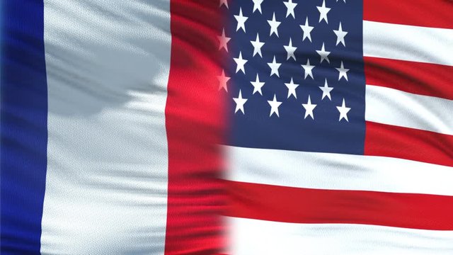 USA and France politicians exchanging top secret envelopes, flags background