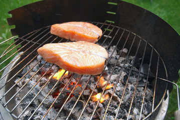 Cooking salmon steaks outdoor