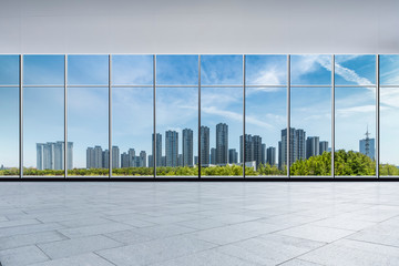 Fototapeta na wymiar Panoramic skyline and buildings from glass window