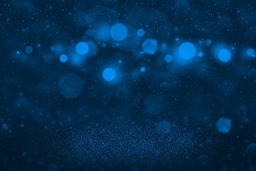 blue pretty shining glitter lights defocused bokeh abstract background with falling snow flakes fly, holiday mockup texture with blank space for your content