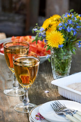 Two glasses of fresh light beer on a wooden table