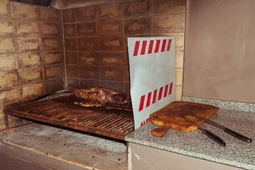 "Parrillada" Argentine barbecue make on live coal (no flame), beef "asado", bread, "Chorizo"