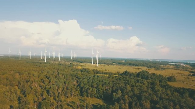 Windmills in summer filde in Estonia, drone footage
