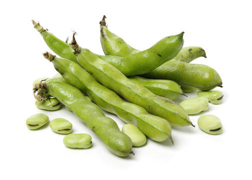 Broad beans on white background