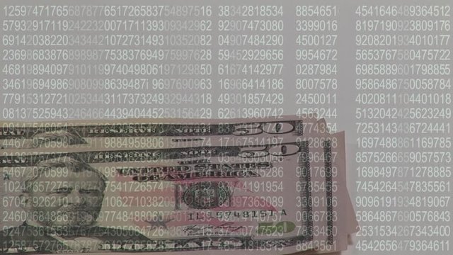 Counting money on a table