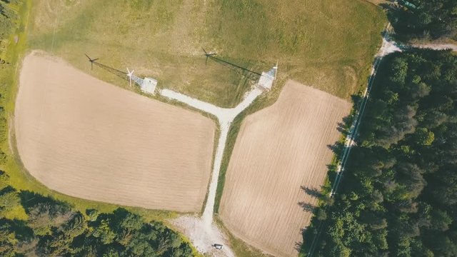 Windmills in summer filde in Estonia, drone footage