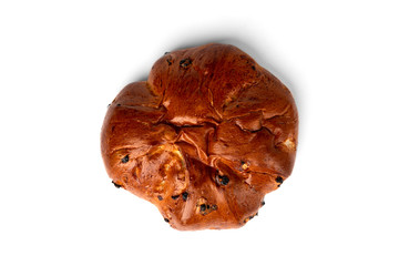 Bun with raisins isolated on white background.