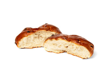 Bun with raisins isolated on white background.